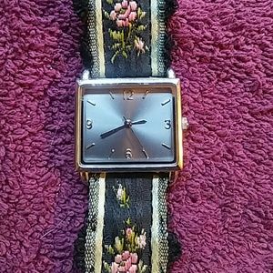 Black cloth with flowers watch